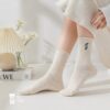 Tất nữ cổ trung màu kem ngà họa tiết Gấu dễ thương